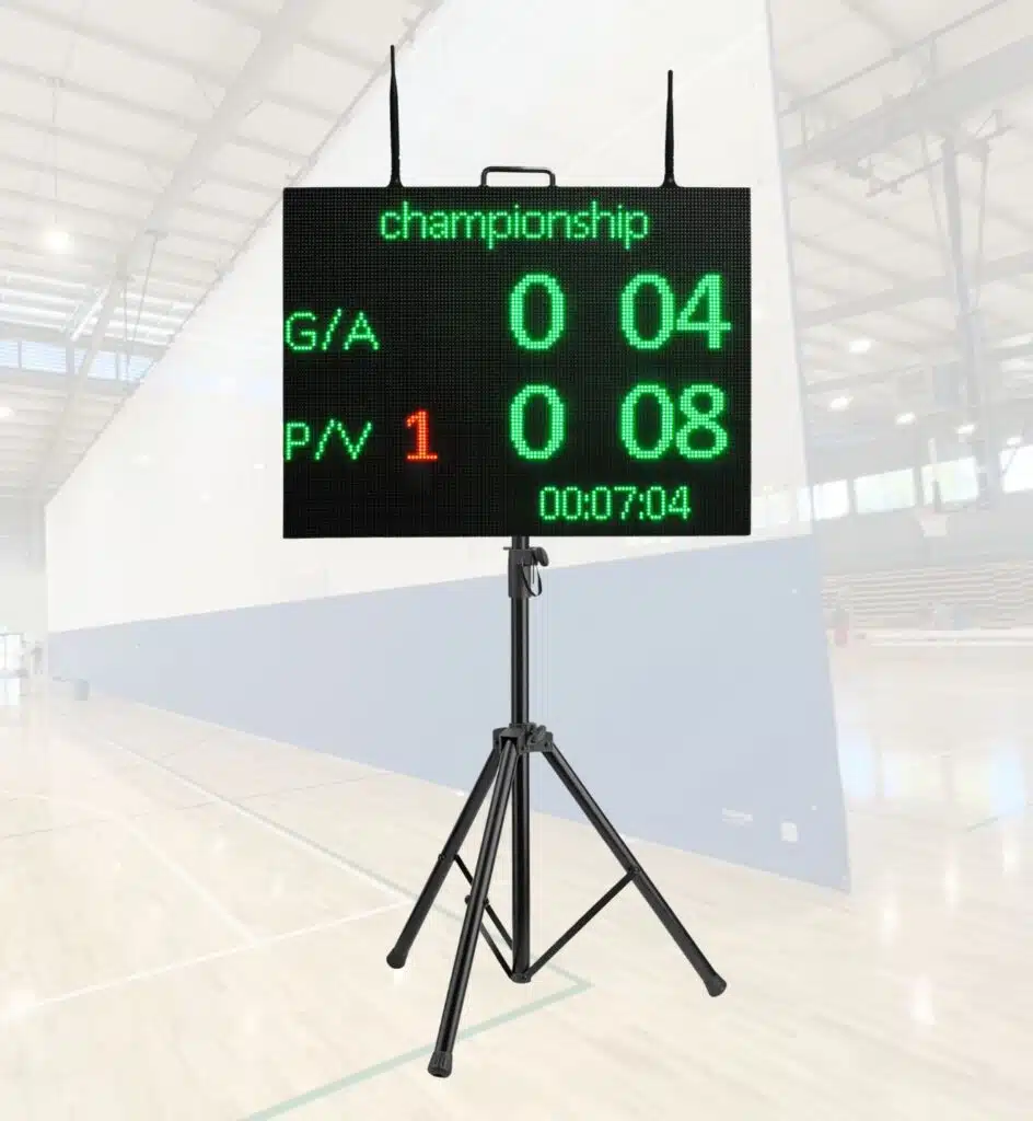 Small Portable Scoreboard - RMA Sport Electronic scoreboard on a tripod in a gym showing 'championship' with scores G/A 0–04, P/N 1–0–08, and a timer reading 00:07:04.