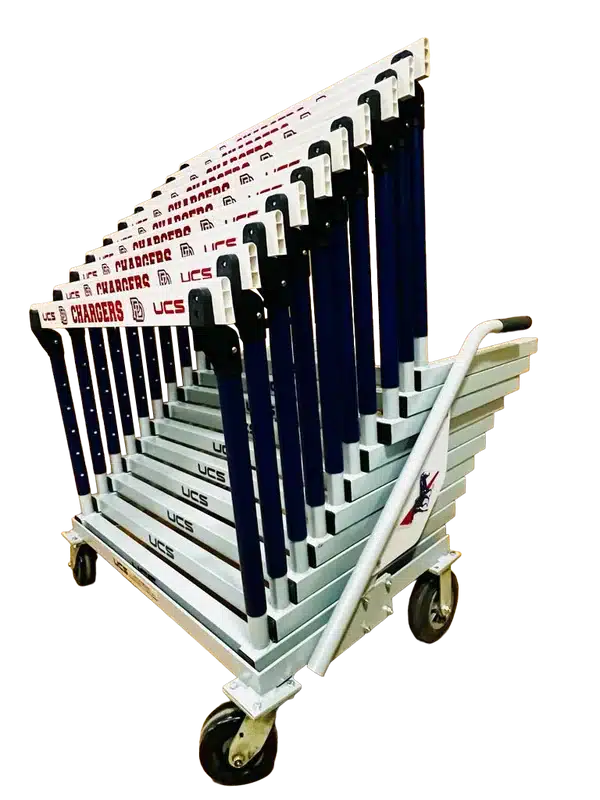 Dolly - gold_series_hurdle_dolly_pd_1_600x_crop_center - RMA Sport Stack of blue and white folding bleachers on a wheeled cart for transport