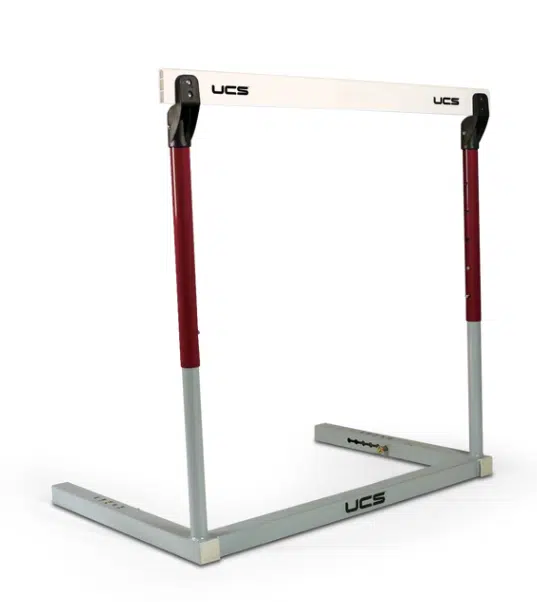 Hurdle Manual - 3000 - Maroon - RMA Sport Adjustable track-and-field hurdle stand with a white crossbar, red vertical supports, and a grey base branded UCS.